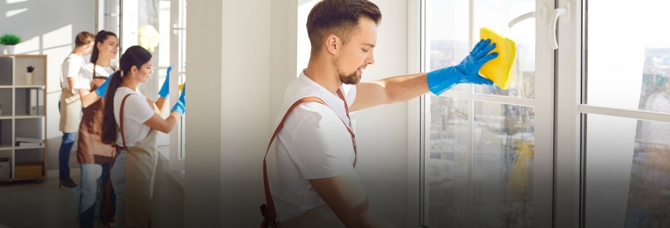 A technician fixing a washbasin showing professional home services in chennai.